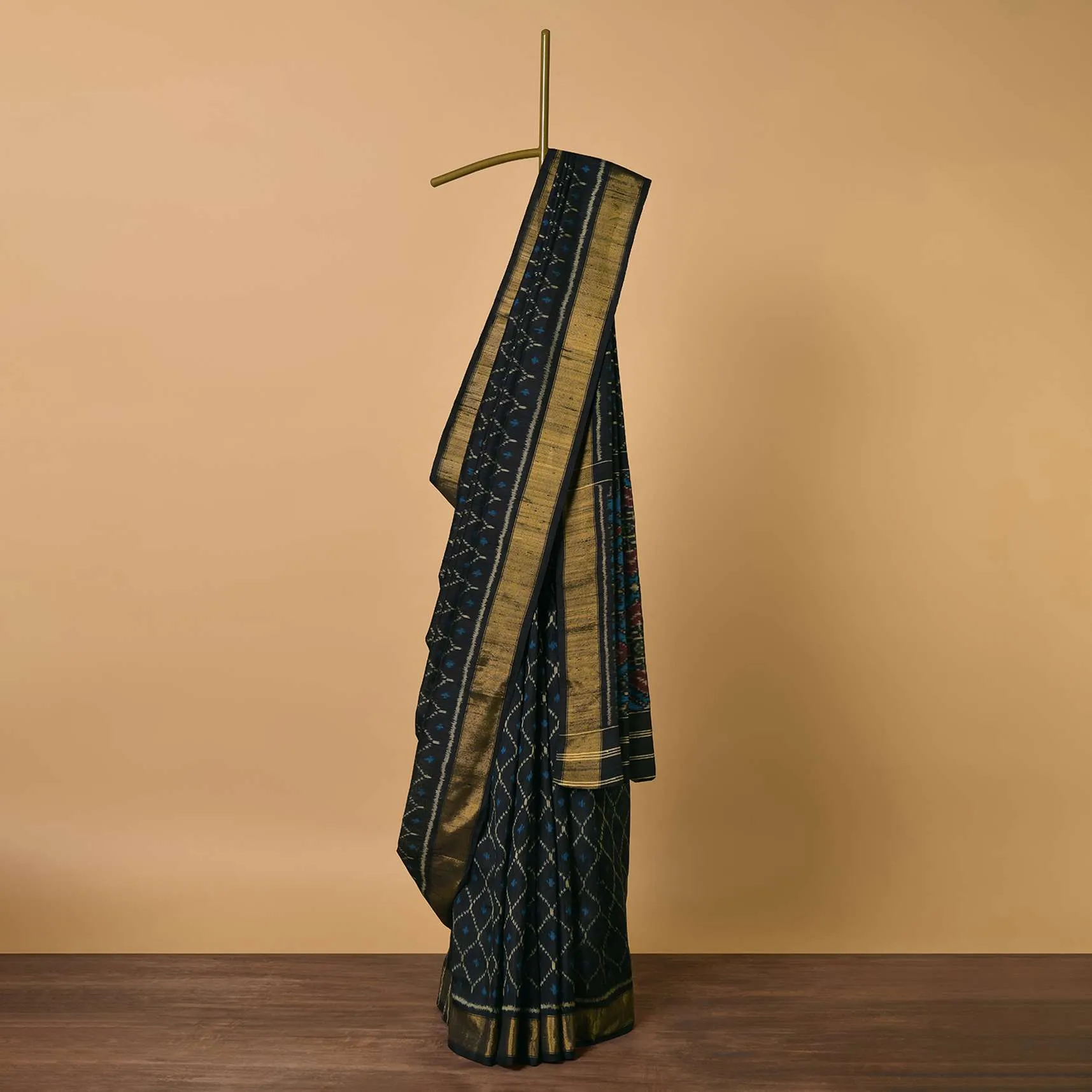 Black Dupion Silk Saree With Ikat Patola Work And Unstitched Blouse Fabric