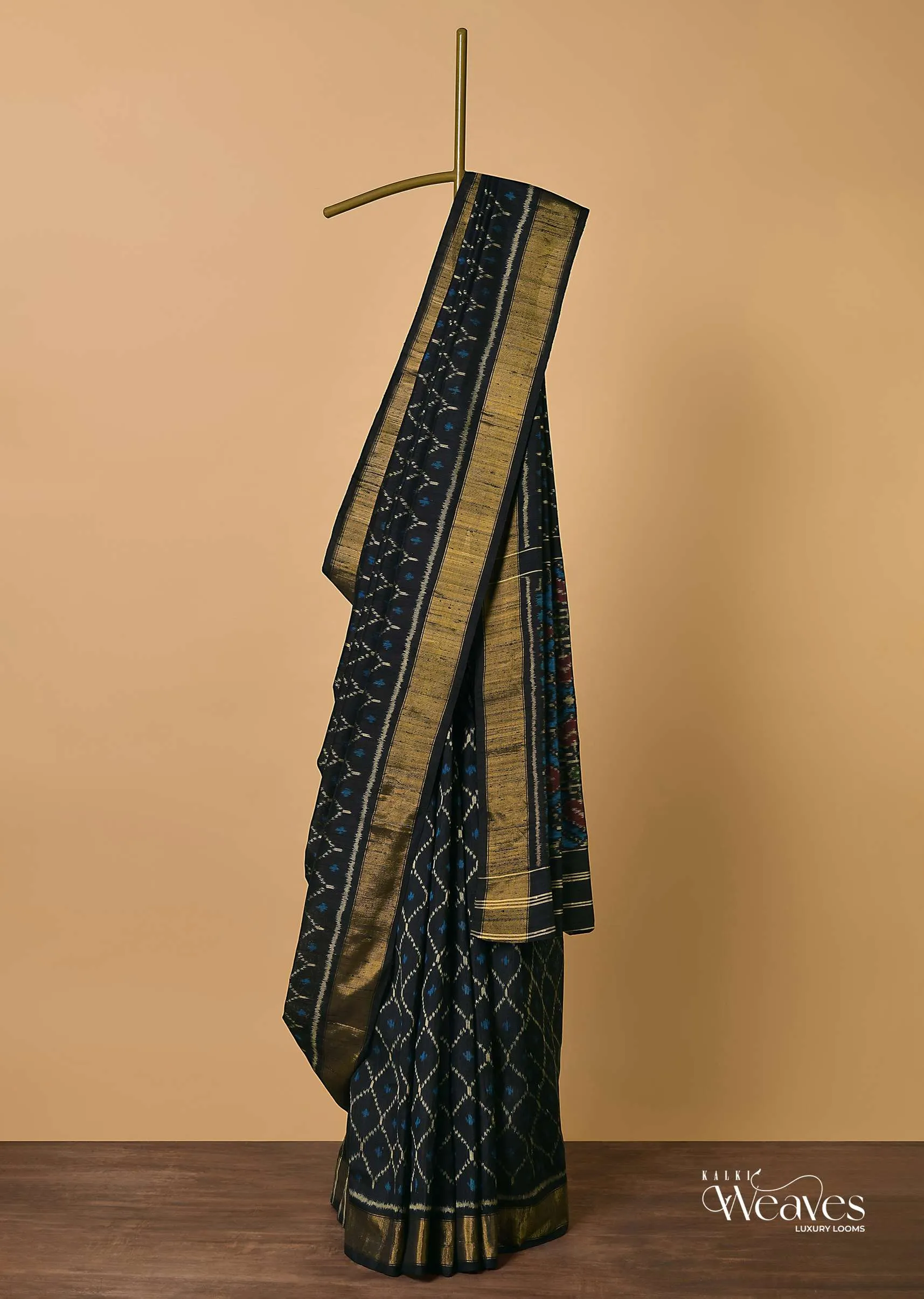 Black Dupion Silk Saree With Ikat Patola Work And Unstitched Blouse Fabric