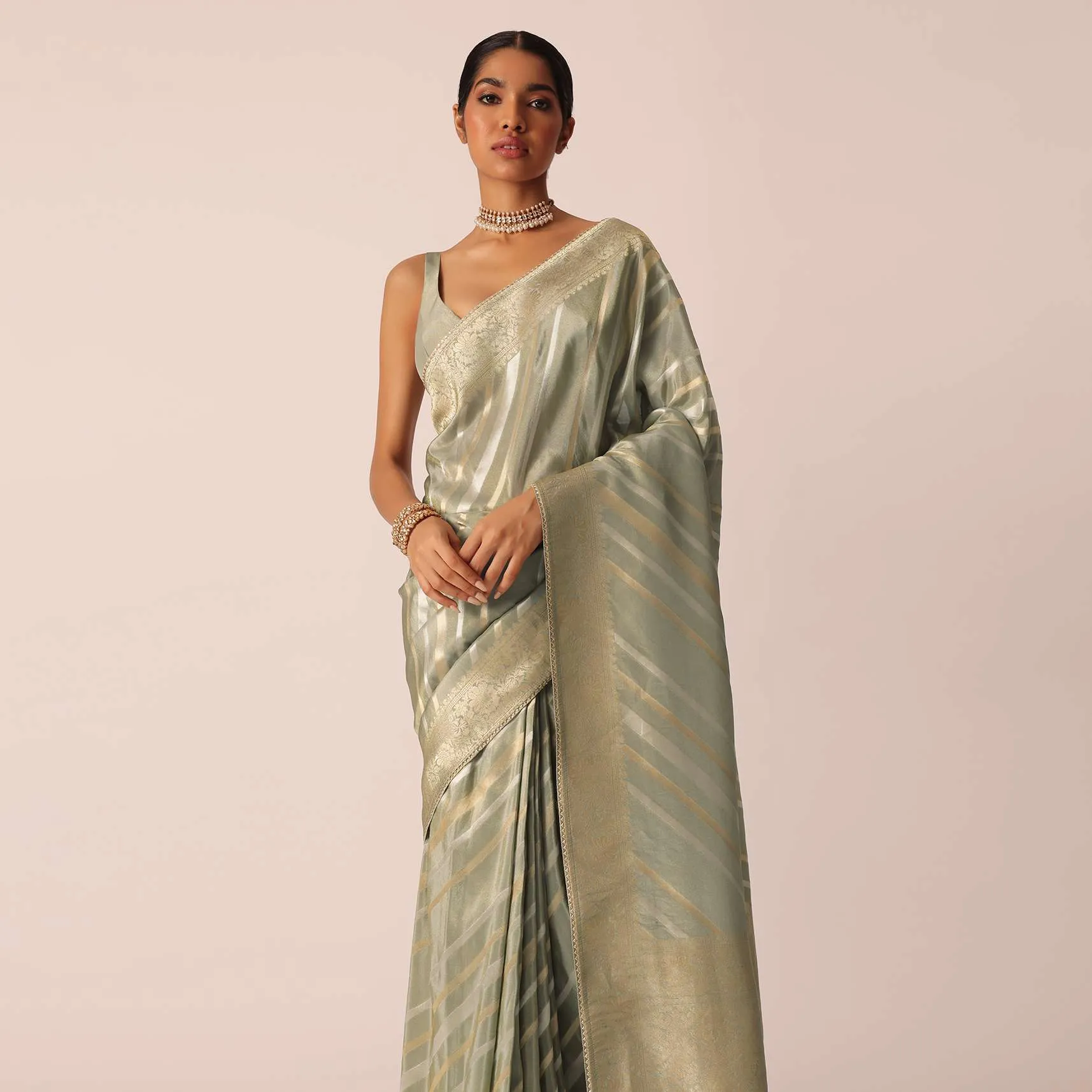 Green Saree In Silk With Diagonal Stripes Pattern And Unstitched Blouse Piece